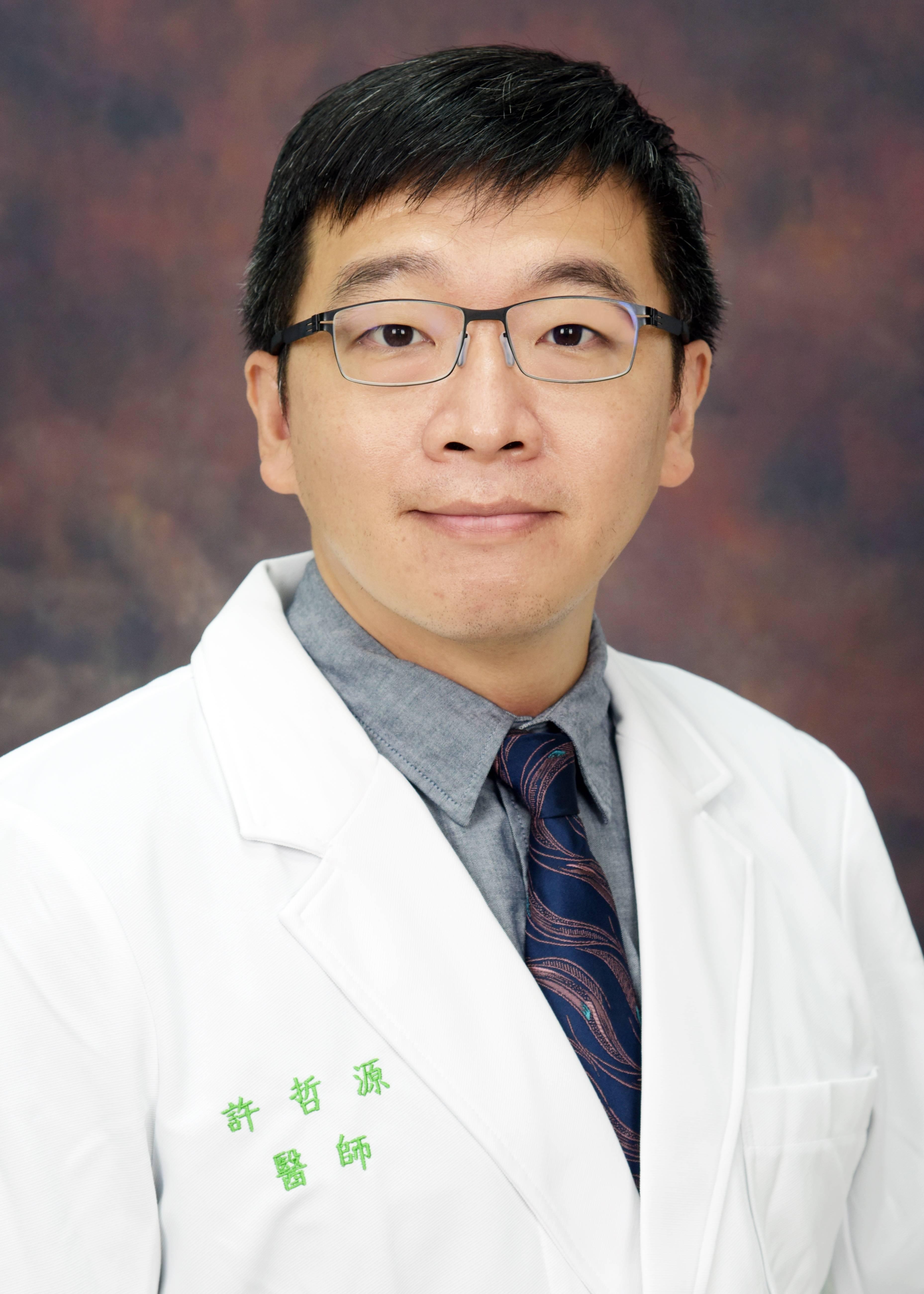 許哲源